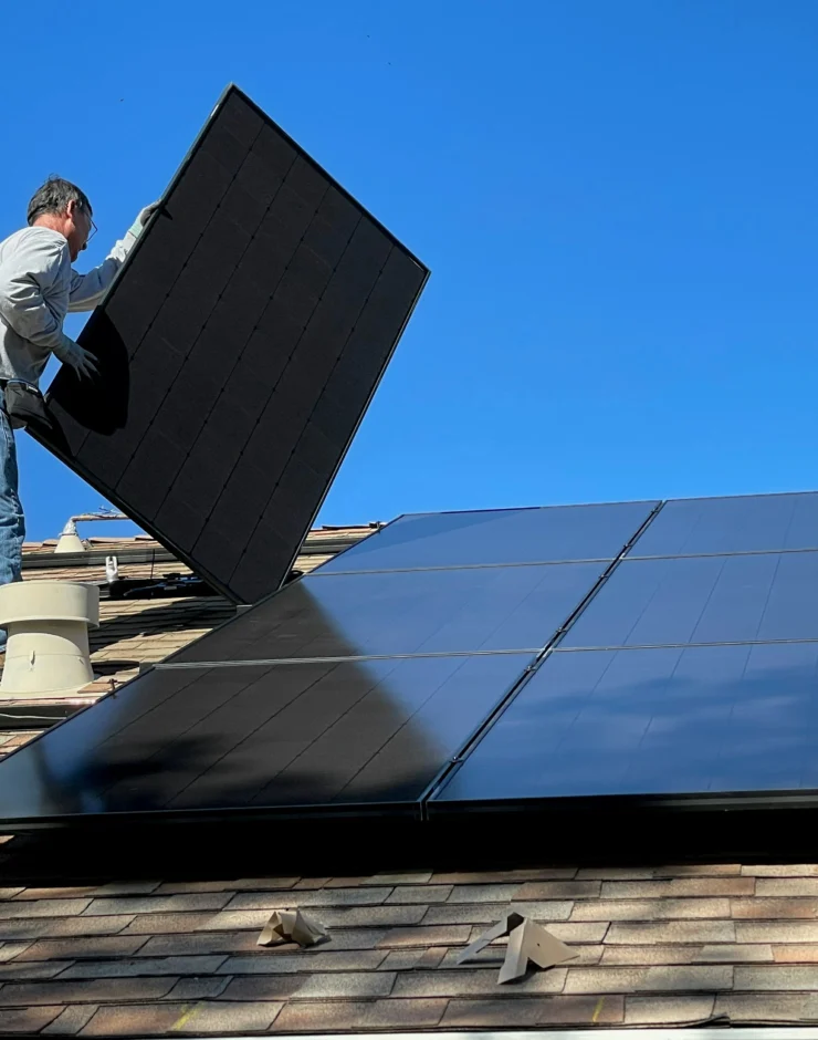 "Solar installation team setting up solar panels